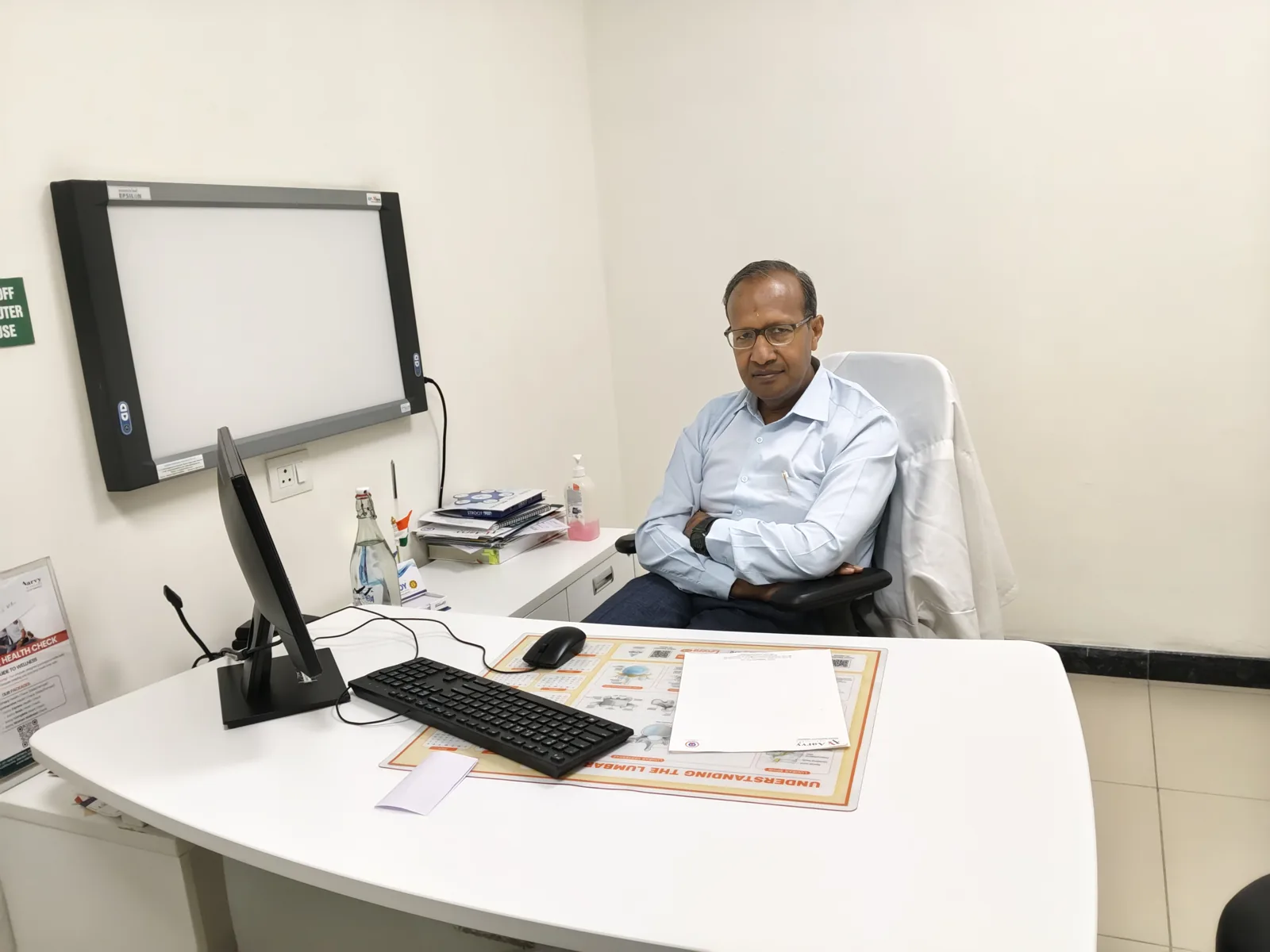 Dr. Deepak Kumar at his consultation desk at Aarvy Healthcare, Gurgaon